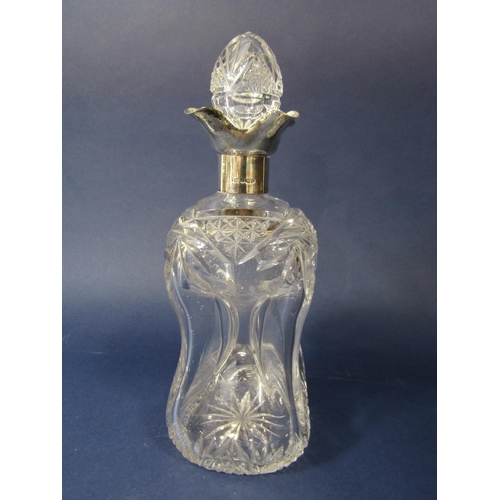 1266 - Good quality cut glass dimpled waisted decanter with star-cut decoration and lobed silver collar, st... 