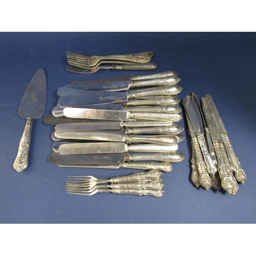 1280 - A large collection of white metal and silver flatware, comprising a set of 14 German white metal han... 