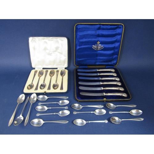 1284 - Cased set of six silver teaspoons together with a further set of eight silver teaspoons with fancy h... 