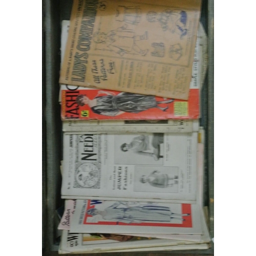 2906 - A suitcase containing a quantity of vintage needle craft and fashion magazines, together with two la... 