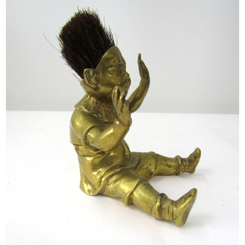 390 - Good quality Victorian brass inkwell/nib wipe in the form of a seated boy, hands aloft, legs apart w... 