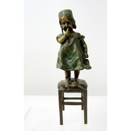 392 - Small bronze figure after Juan Clara of a child in a green dress, bound standing on a stool, one sho... 