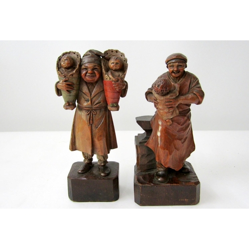 396 - 2 Arni (Italian) wood carved figures, old man holding a mall child  ad a man proudly holding a pair ... 