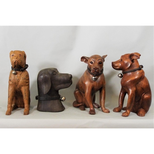 90 - Four various carved hardwood figures of dogs, 36cm max