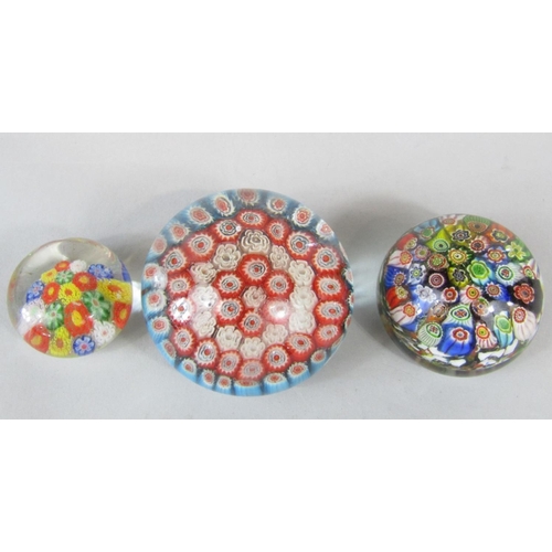 1173 - Three millefiori paperweights, the largest 7.6cm diameter (3)