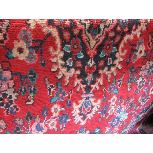 1797 - Persian rug with floral spray decoration in blue upon a red ground, 260 x 160cm