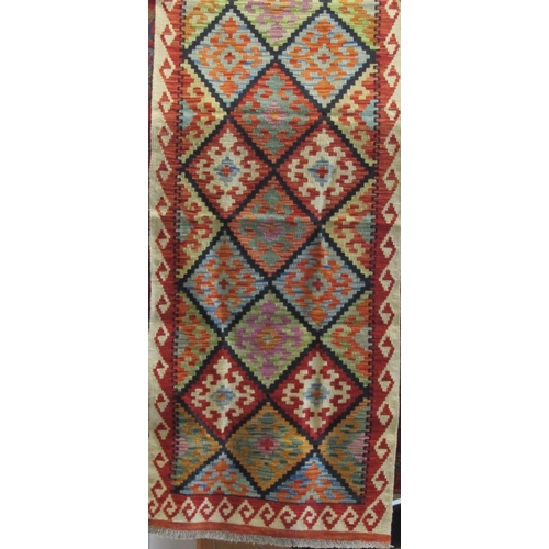 1806 - Choli Kelim runner with multi coloured medallion decoration, 250 x 75cm