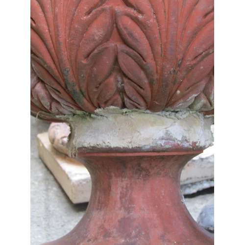 2010 - A pair of Doulton Lambeth garden urns with flared rims and raised repeating acanthus leaves and squa... 