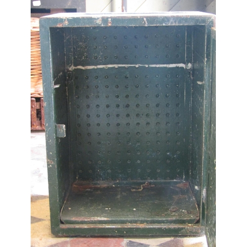 2075 - A Durasteel fire resisting cabinet enclosed by a single door with brass handle, 43 cm wide x 33 cm d... 