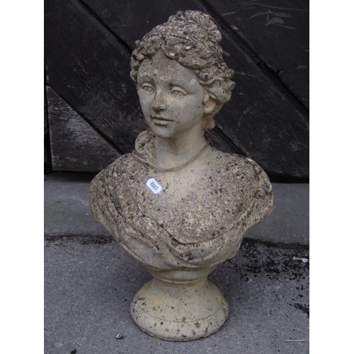 2090 - A small weathered buff coloured composition stone female head and shoulder bust 40 cm high