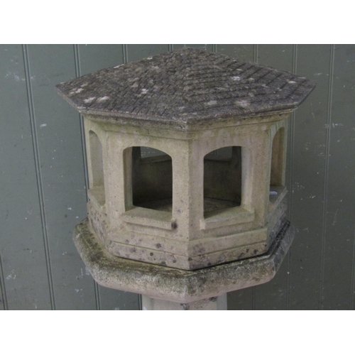 2107 - A good quality partially weathered cast contemporary three sectional bird table of octagonal form wi... 