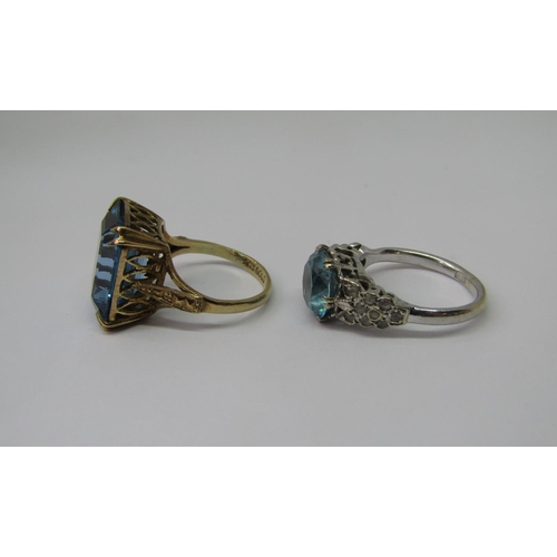 1301 - 9ct blue spinel dress ring, size L and a further 9ct white gold blue spinel example, size M, 9.7g to... 