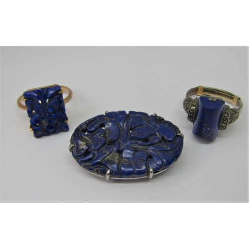 1303 - Group of lapis lazuli set jewellery to include a 9ct carved foral plaque ring, a further silver Art ... 