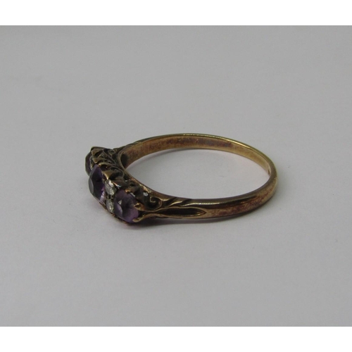 1319 - 18ct amethyst and diamond ring with scrolled mount, size R/S, 3.5g