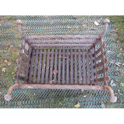 2067 - A cast iron fire basket of rectangular form with rope twist bars and toadstool finials, 60 cm x 50 c... 