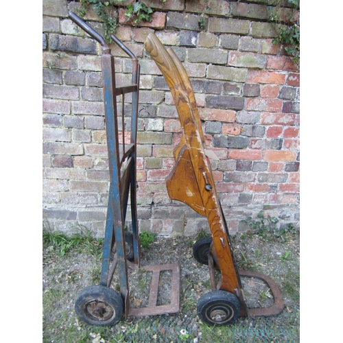 2069 - A vintage heavy duty sack truck with ashwood shafts and square through jointed splats, cast iron ope... 