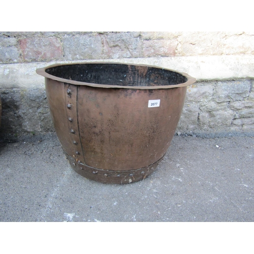 2077 - An old copper with flared rim and riveted seams, 58 cm diameter approx