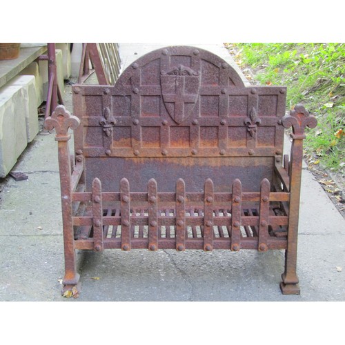 2067 - A cast iron fire basket of rectangular form with rope twist bars and toadstool finials, 60 cm x 50 c... 