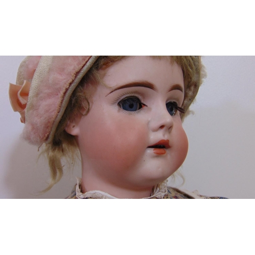 27 - 2 early 20th century bisque socket head dolls, both approx 55 cm tall with jointed composition body,... 