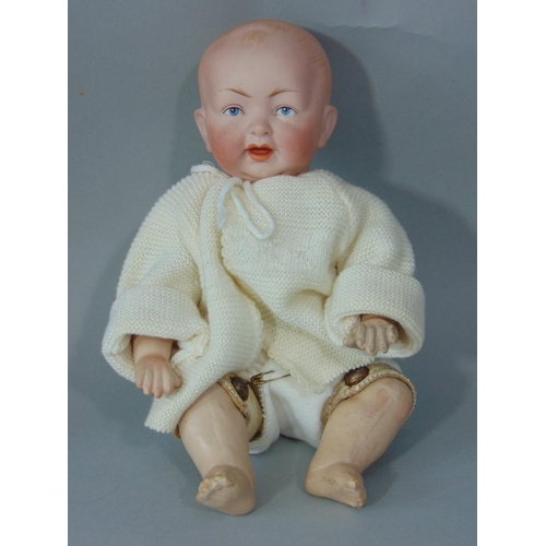 86 - Early bisque socket head character baby boy doll by Kestner, with kid body and kid upper legs, joint... 