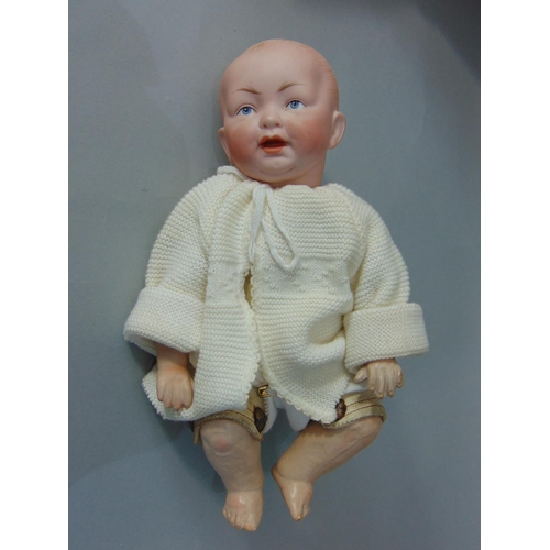 86 - Early bisque socket head character baby boy doll by Kestner, with kid body and kid upper legs, joint... 