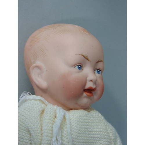 86 - Early bisque socket head character baby boy doll by Kestner, with kid body and kid upper legs, joint... 