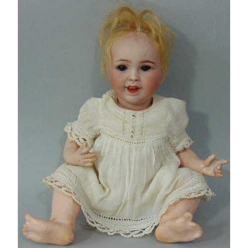 88 - Small character doll marked 'SFBJ 236 Paris 0', laughing Jumeau type, with bisque head closing blue ... 