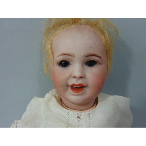 88 - Small character doll marked 'SFBJ 236 Paris 0', laughing Jumeau type, with bisque head closing blue ... 