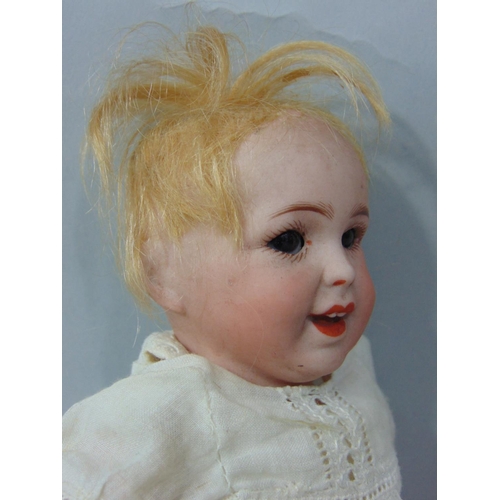 88 - Small character doll marked 'SFBJ 236 Paris 0', laughing Jumeau type, with bisque head closing blue ... 