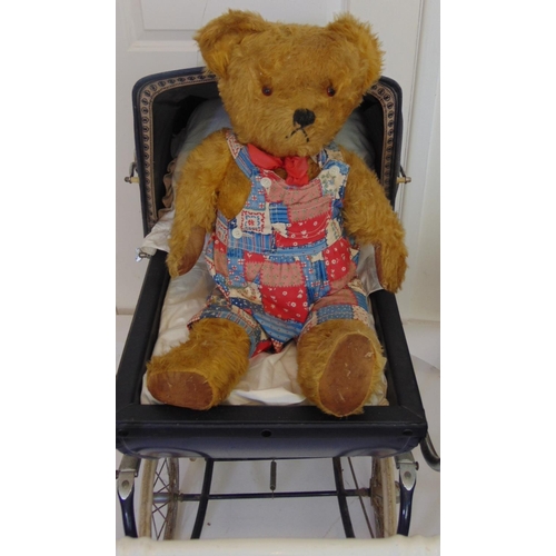 68 - 2 large vintage teddy bears with a wooden high chair and Silver Cross dolls pram; bears have golden ... 