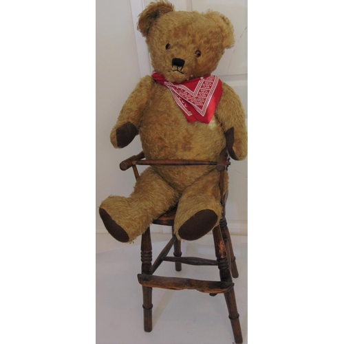 68 - 2 large vintage teddy bears with a wooden high chair and Silver Cross dolls pram; bears have golden ... 