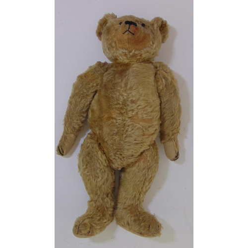 69 - An early bear, circa 1930's, probably Merrythought, with boot button eyes, a weak growl, golden moha... 