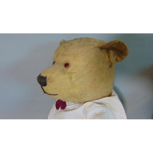 72 - 2 old bears; 1930's teddy bear, probably Chiltern with worn fur, straw stuffing, small glass eyes cl... 