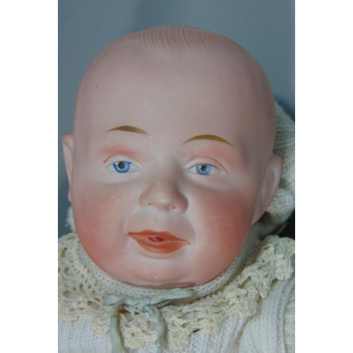 102 - 2 early 20th century dolls;  Gebruder Knoch 205 bisque shoulder-head character doll, circa 1910, wit... 