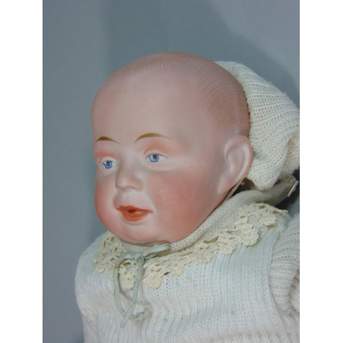 102 - 2 early 20th century dolls;  Gebruder Knoch 205 bisque shoulder-head character doll, circa 1910, wit... 