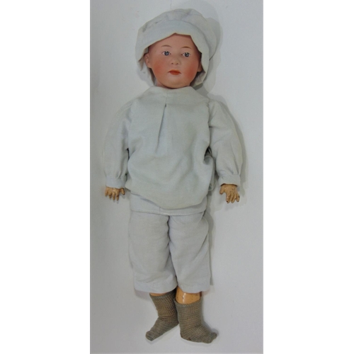 103 - Gebruder Heubach  bisque head boy doll with moulded hair, fixed intaglio eyes with highlight spot, c... 