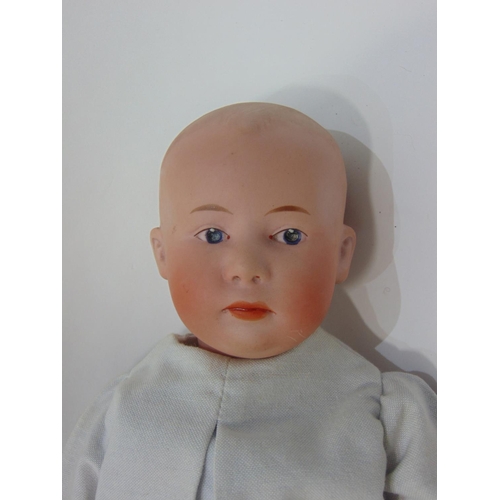 103 - Gebruder Heubach  bisque head boy doll with moulded hair, fixed intaglio eyes with highlight spot, c... 