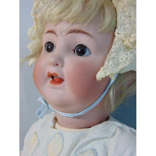 104 - Alt Beck & Gottschalck bisque head baby doll, with sleeping brown eyes and open mouth with two top t... 