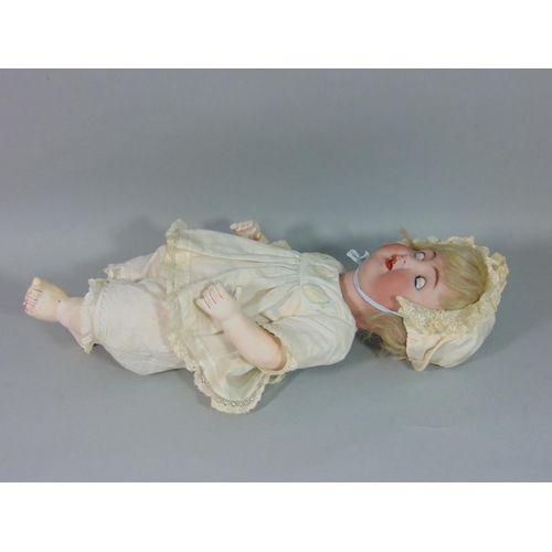 104 - Alt Beck & Gottschalck bisque head baby doll, with sleeping brown eyes and open mouth with two top t... 