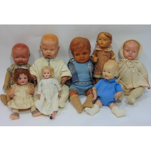 108 - 9 small 20th century dolls including 1960's Goebel/ Hummel puppee girl, probably rubber, height 28cm... 