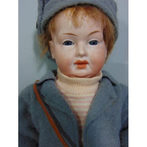 90 - A small bisque head character doll by Eisenmnn, early 20th century, with painted features and jointe... 