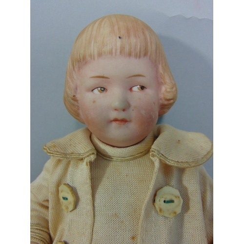 91 - A small German all-bisque doll, unmarked, probably by Gebruder Heubach, with jointed 5 piece body, p... 