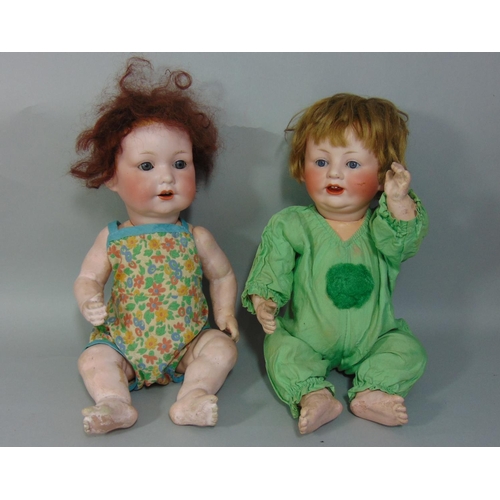 92 - A Franz Schmidt bisque head character baby doll, with closing blue eyes and open mouth with two top ... 