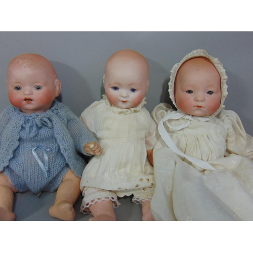 95 - Collection of 6 small German bisque heads dolls with composition bodies including girl and boy with ... 