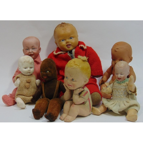 105 - Collection of 7 small dolls including a Norah Welling black velvet doll in dungarees, a bisque head ... 