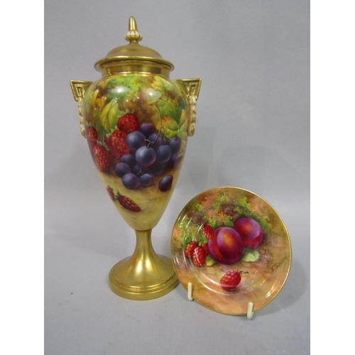 1054 - A Royal Worcester Blush Ivory urn shaped vase and cover with painted grape, strawberry and blackberr... 