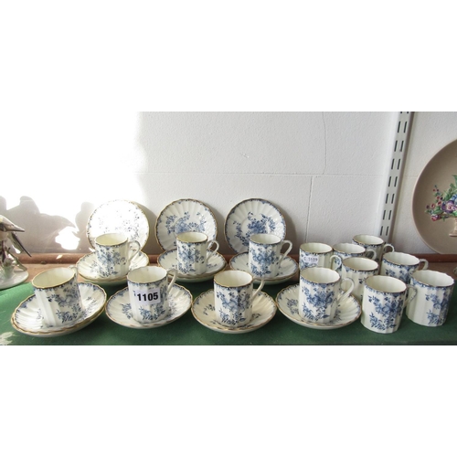 1071 - A collection of Royal Worcester Mansfield pattern coffee cans and saucers with blue printed floral d... 