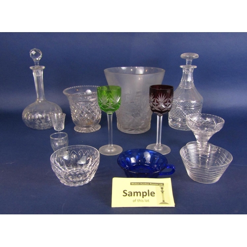 1116 - A collection of glassware including two cut glass decanters and stoppers, further decanter and stopp... 