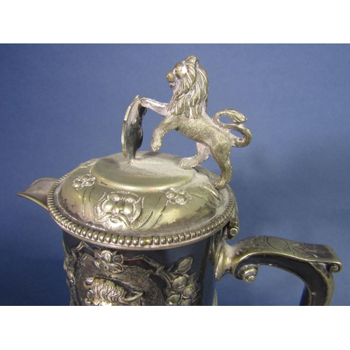 1144 - A good quality silver plated baluster claret jug with star cut glass, the silver plated top with cas... 