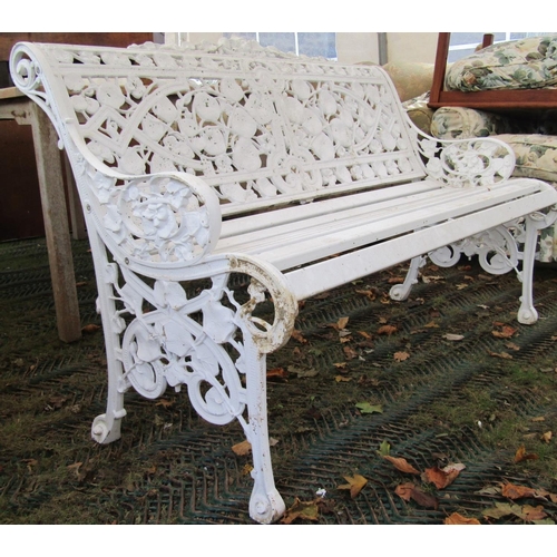 2072 - A Coalbrookdale style two seat garden bench, the cream painted cast alloy frame with decorative pier... 